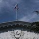 Russian flag and flag of Crimea over the city council of Yalta on August 11, 2015 in Yalta, Crimea. Russian President Vladimir Putin signed a bill in March 2014 to annex the Crimean peninsula but Ukraine and most of the international community do not recognize its annexation.